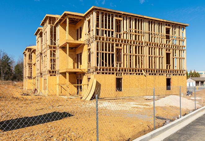 a snapshot of temporary chain link fences protecting a large construction project from unauthorized access in Evanston IN